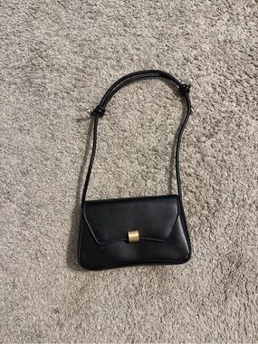 Classic Black Shoulder Bag with Gold Accent